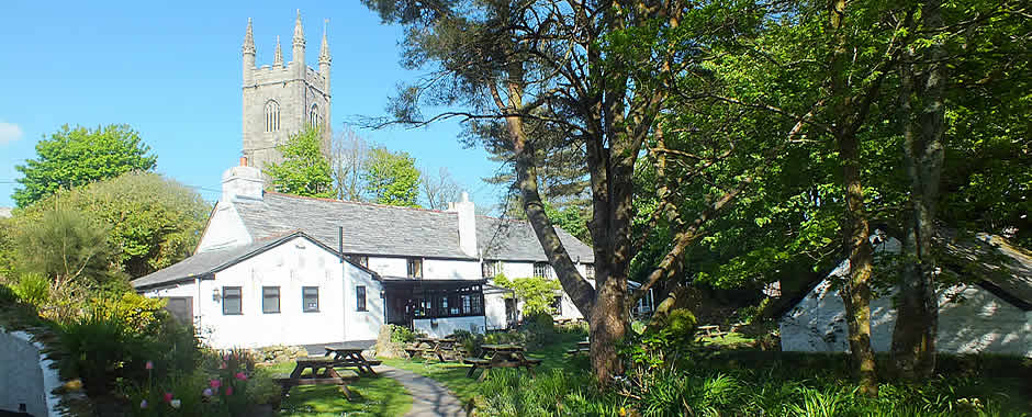 The Crown Inn with Lanlivery Church in the background