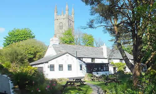 The Crown Inn with Lanlivery Church in the background